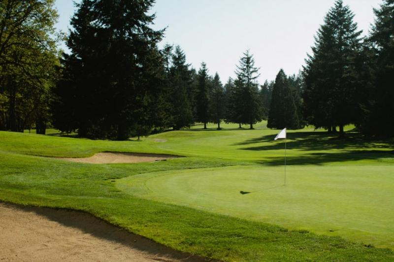 A picture from the hole looking back on the course that shows off the bunkers