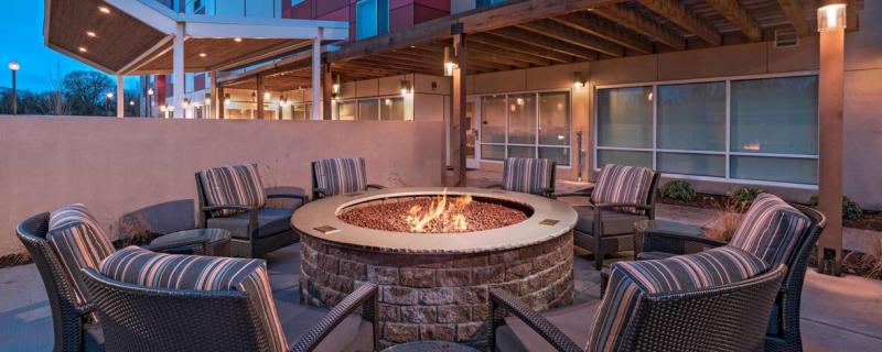 A communal firepit outside for guests 