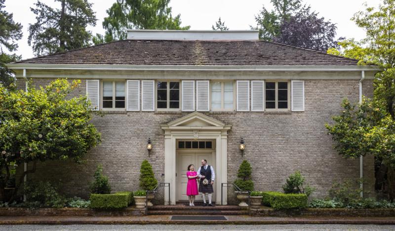 Couple standing in a doorway at Lakewold Gardens Mansion (Lakewood, WA)